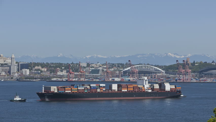 SEATTLE, USA - MAY 12: Timelapse of a cargo freighter in the harbor bay front of