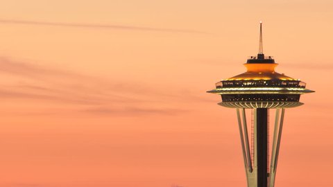 SEATTLE, USA - MAY 12, 2012: Timelapse of Seattle Space Needle during sunset. Space Needle in new orange painting for 50 year anniversary of the world exhibition in 2012.