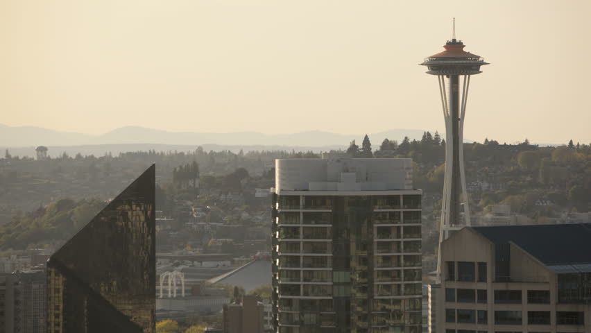 Timelapse of Seattle Space Needle sunset to blackout. Space Needle in new orange