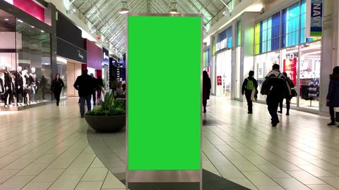 Coquitlam, BC, Canada - January 18, 2017 : Green billboard for your ad inside Coquitlam shopping mall with 4k resolution