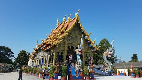 CHIANG RAI, THAILAND - DECEMBER 3 : 4K Unidentified tourists visit and take photo in front of Wat Rong Sua Ten temple on December 3, 2016 in Chiang rai, Thailand