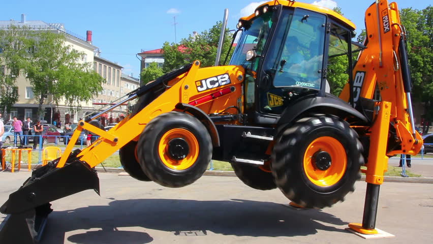 UFA, RUSSIA - MAY 22, 2012: Demonstration of multifunctional tractor at the