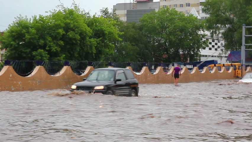 UFA, RUSSIA - JULY 10, 2011: flooding in town streets after torrential rain in
