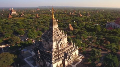 Bagan, Myanmar (Burma), aerial view of ancient temples and pagodas at sunset. The Bagan Archaeological Zone is a main draw for the country's nascent tourism industry.