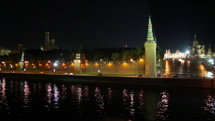 Moscow Kremlin river night landscape with ship - timelapse