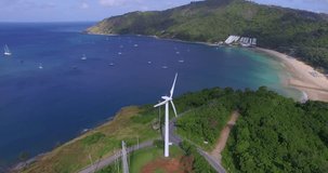 Aerial: Flying around the windmill. Promthep cape. Naiharn and Yanui beach.