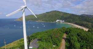Aerial: Takeoff near the windmill with the view on Naiharn beach.