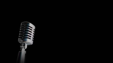 Retro microphone Vintage silver microphone slowly rotating on shiny flickering black background 