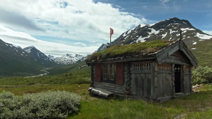Cabin with a norwegian flag in Jotunheimen National Park Norway