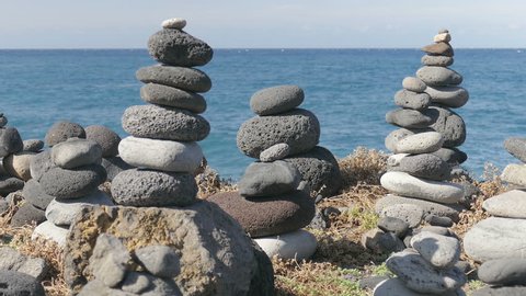 Stacked stones on wild coast/stacked stones/objects
