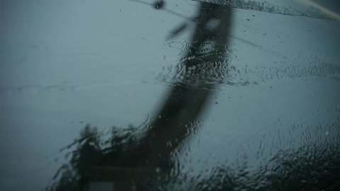 Rain hit glass in rainy season.Speeding train travel,scenery outside window. gh2_03035
