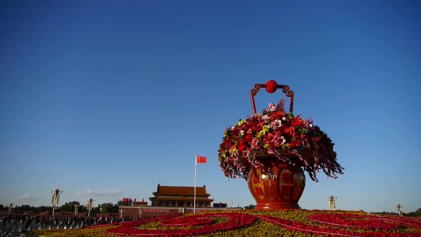 gorgeous baskets full of flowers in blue sky.Beijing Tiananmen Square sunny. gh2_04315