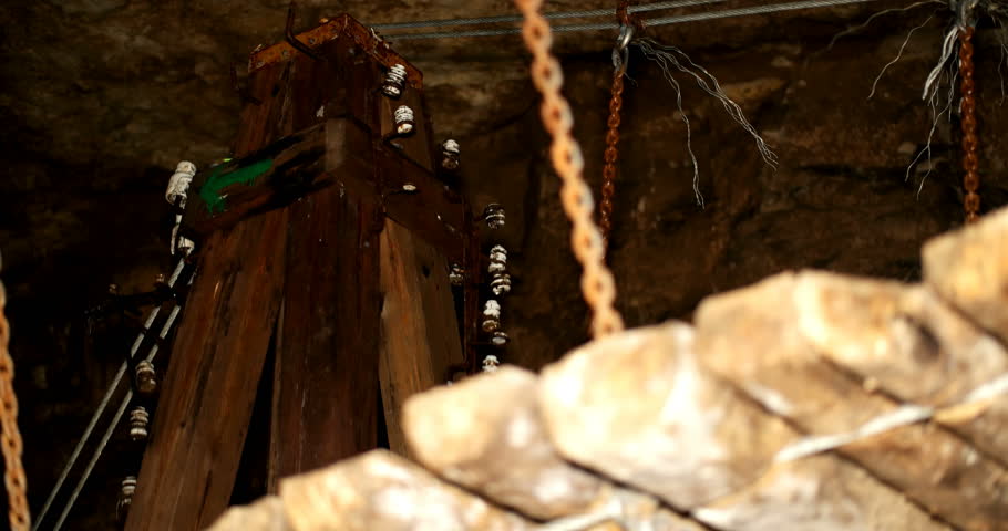 a guy with a torch goes to the cave