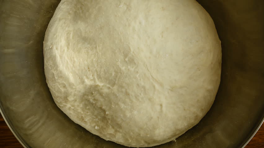 Closeup 4k video of yeast dough increases, time lapse Royalty-Free Stock Footage #23363185