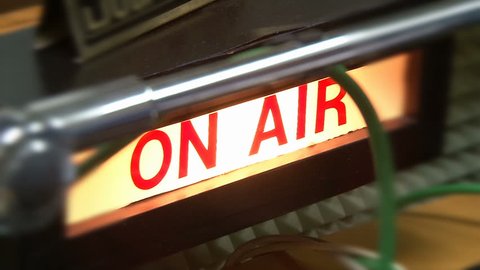 The board "On air"  at radio station 