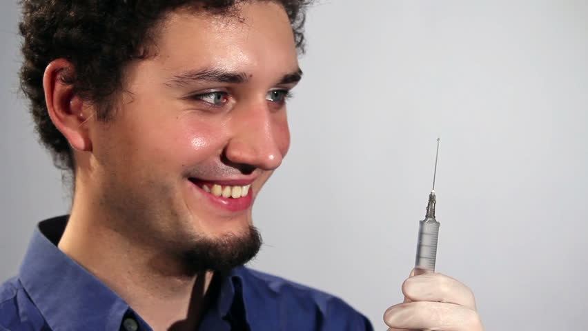 young doctor with a syringe closeup
