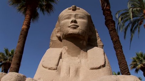 an egyptian statue in sphinxes avenue in Luxor temple tilt up
thebe egypt nile river unesco site