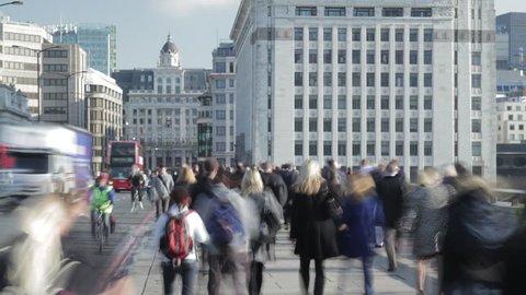 Time-lapse of rush hour commuters and traffic on London Bridge