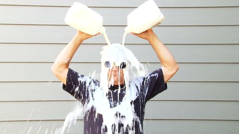 Got Milk anyone? Humorous clip of man pouring two gallons of milk over his head.
