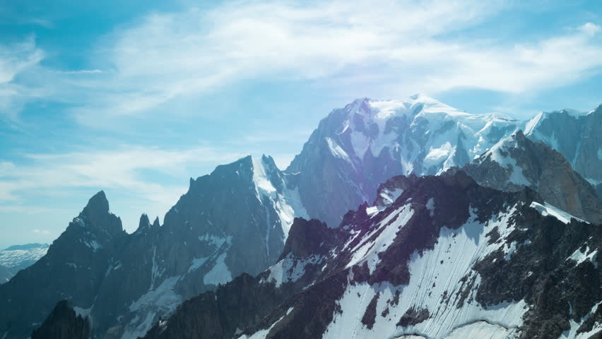 Movement of the clouds on the mountains range near the Mont Blanc, 4K timelapse 