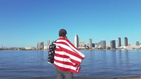 Video of man holding usa flag in real slow motion. High quality video of man holding usa flag in real 1080p slow motion 120fps