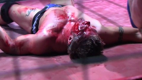 PORTSMOUTH - AUGUST 6: Cage Wrestling - Wrestler Bleeding during VPW Wrestling Show on August 6, 2009 in Portsmouth, England.