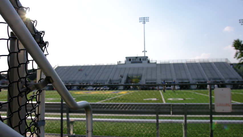 Empty high school football stadium view from the bleachers
