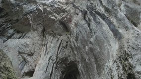 Vertical movement at the entrance to a cave from which emerge a river 10
 - Powered by Shutterstock - Get 15% off with code: PIKWIZARD15