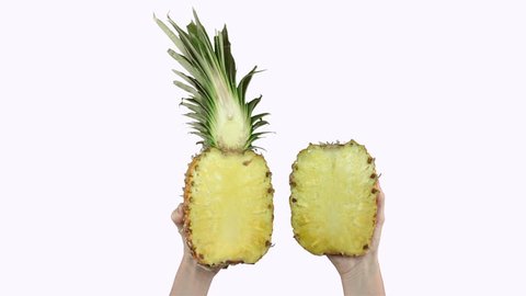 Ananas Already Cut Half Held By Stock Footage Video (100% Royalty-free