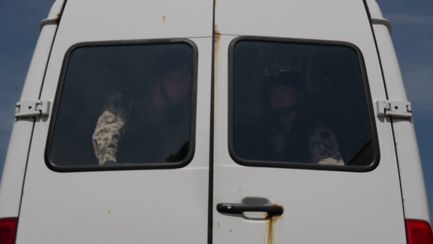 Soldiers leaving van