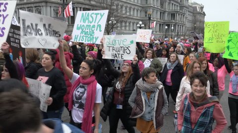 WASHINGTON, DC - JAN. 21, 2017: Women's March on Washington on 17th St. near White House; "Donald Trump Has Got to Go" chant, part of gigantic turnout that flooded DC in show of solidarity.

