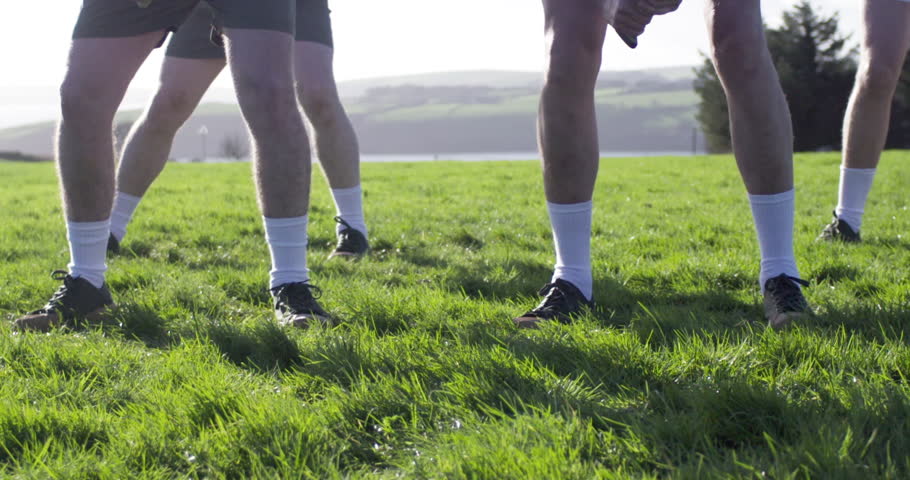 Hurling game starts by referee throwing the ball in Ireland field sport