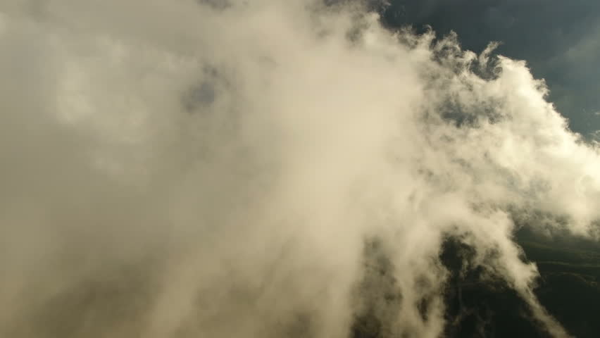 Fly through the clouds. Aerial drone smooth filming above puffy clouds. | Shutterstock HD Video #23460688