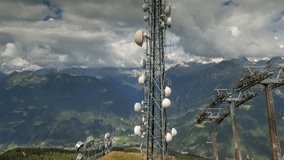 timelapse of the amazing dolomites mountains in the Italian Alps. this clip focuses on a telecommunications structure