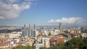 4k beautiful timelapse time lapse clouds passing over busy modern city Barcelona sunny day building construction aerial