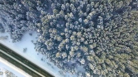 aerial view of winter Altay fields, forest and road