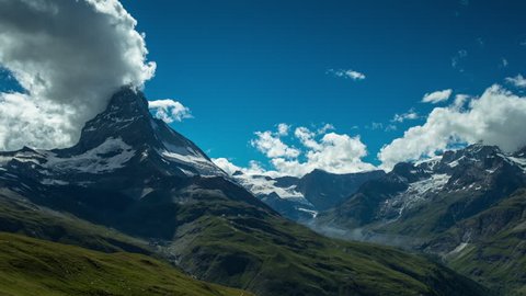 timelapse of the amazing matterhorn and surrounding mountains in the Swiss Alps with fantastic cloud formations