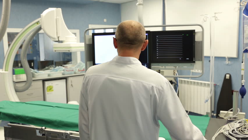 New neurosurgery room in a modern hospital specialized in treatment of cerebrovascular diseases. Medical specialty concerned with the diagnosis, surgical treatment, and rehabilitation. Doctor working.