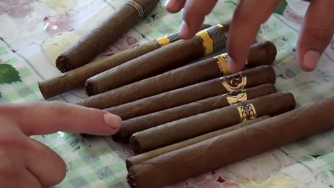 CUBA, - NOVEMBER 20:
Illegal trade in of cigars in Cuba. Cigars on the kitchen table of that seller.
November 20, 2016 in Havana, Cuba