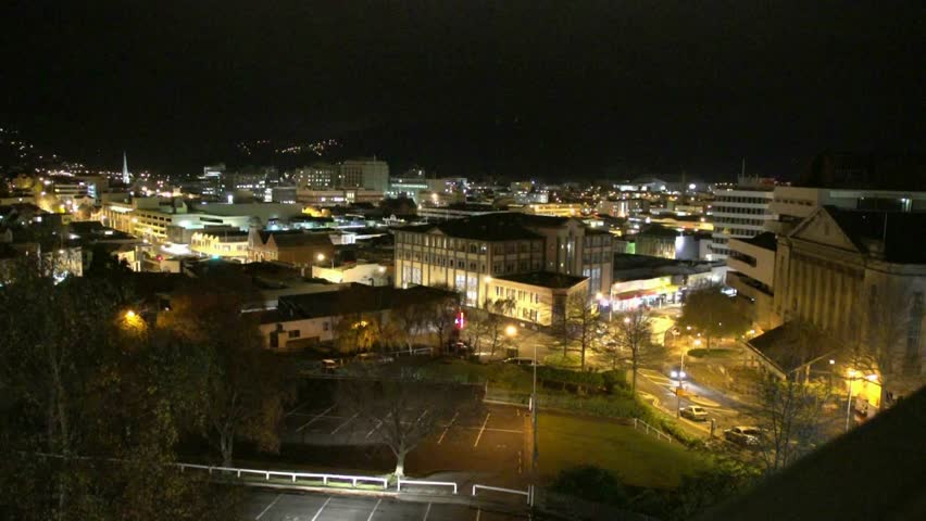 view over Dunedin city at night with all the building and street lights on