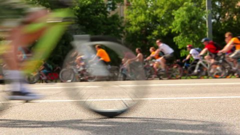Many unrecognizable people ride on bicycles  (tilt-shift) Stock Video