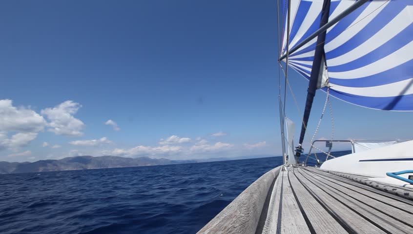 Sailing in the wind through the waves (HD) Sailing boat shot in full HD at the