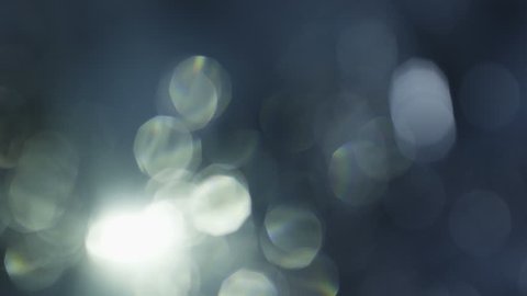 Abstract defocused crystal elements on black background. This footage can be used on first plan of different videos by blend modes Overlay or Screen. Shot on RED cinema camera . 4K