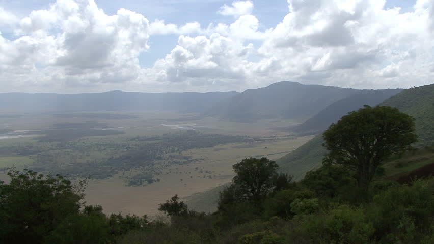 A slow pan from right to center of Ngorongro Crater in Tanzania, Africa. Combine