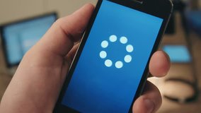 Loading icon amimation on a smartphone - Powered by Shutterstock - Get 15% off with code: PIKWIZARD15