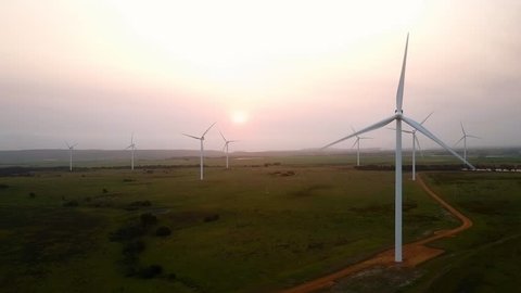 eco power wind energy farm at sunrise, future of sustainable energy innovative technology