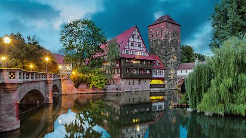 Maxbrucke bridge and Henkerturm tower - part of western medieval fortifications of Nuremberg (static image with animated sky and water)
