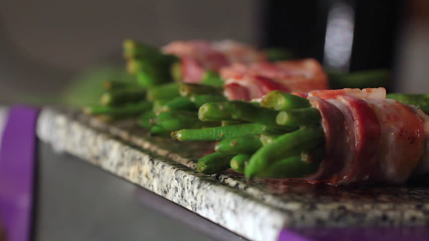 Beans wrapped in bacon