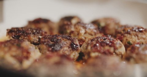 Fried Pork Meatballs or Cutlets, meatloaf in Frying Pan.