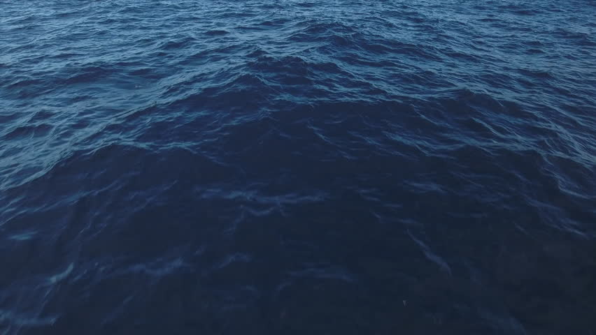 Flyover over ocean after horizon